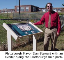Mayor Dan Stewart with a new exhibit on the Plattsburgh bike path.