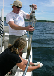 Vermont DEC staff taking sediment samples from Lake Champlain.