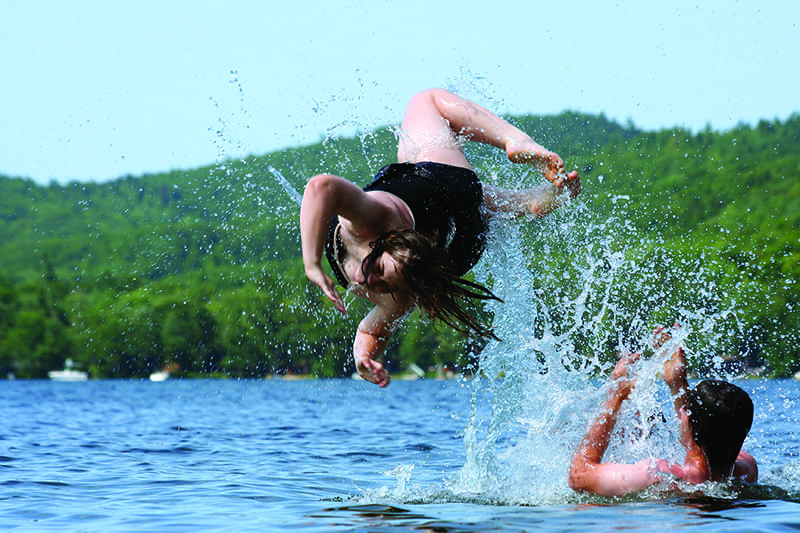 swimmer jumping in water